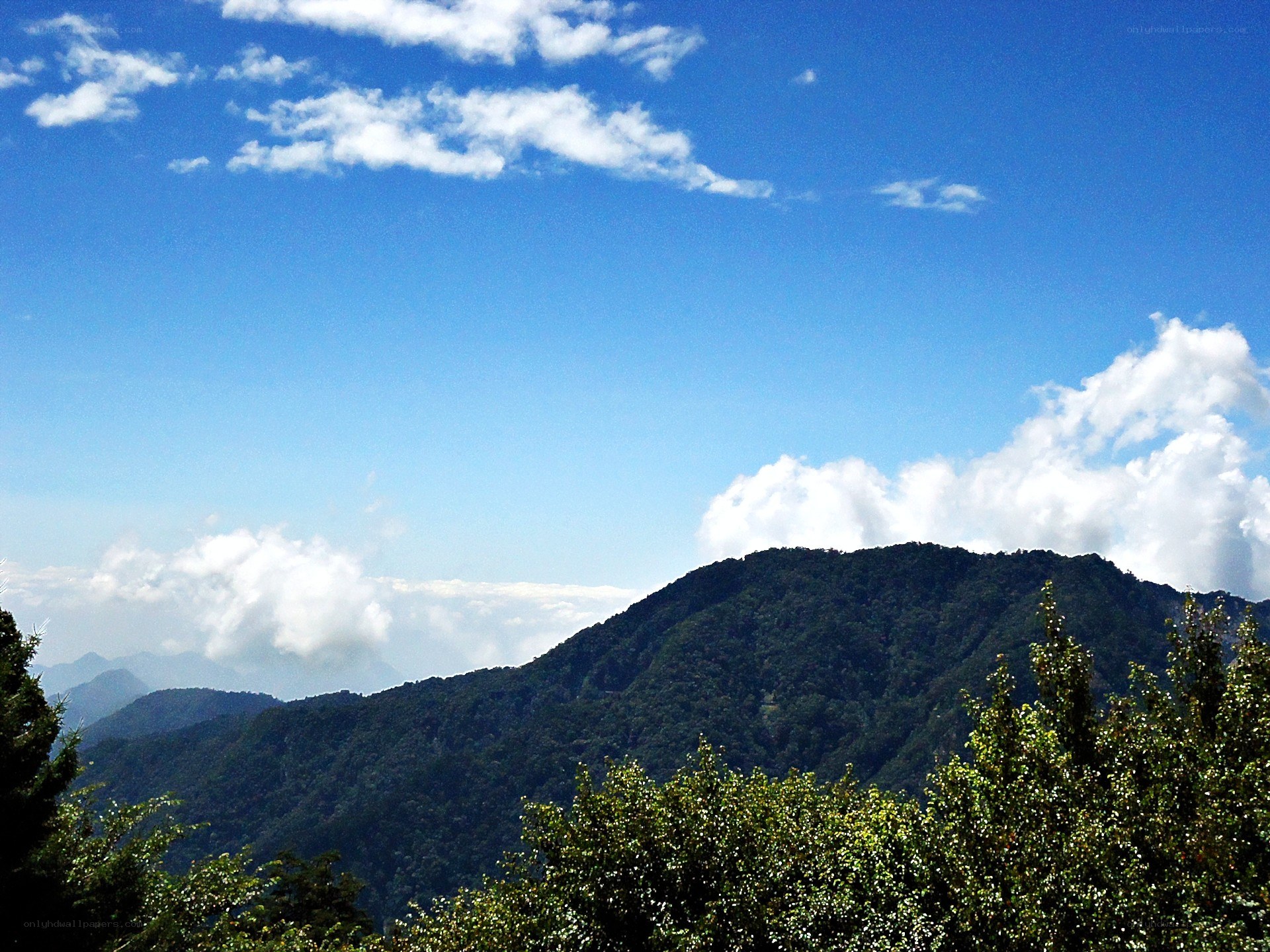 Mountain peak under blue sky
