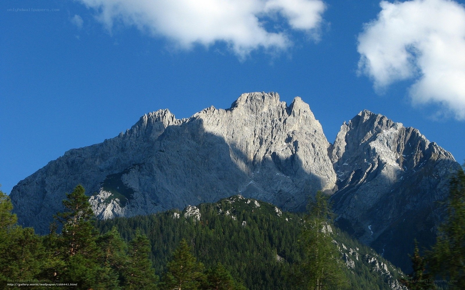 Mountain peak under blue sky