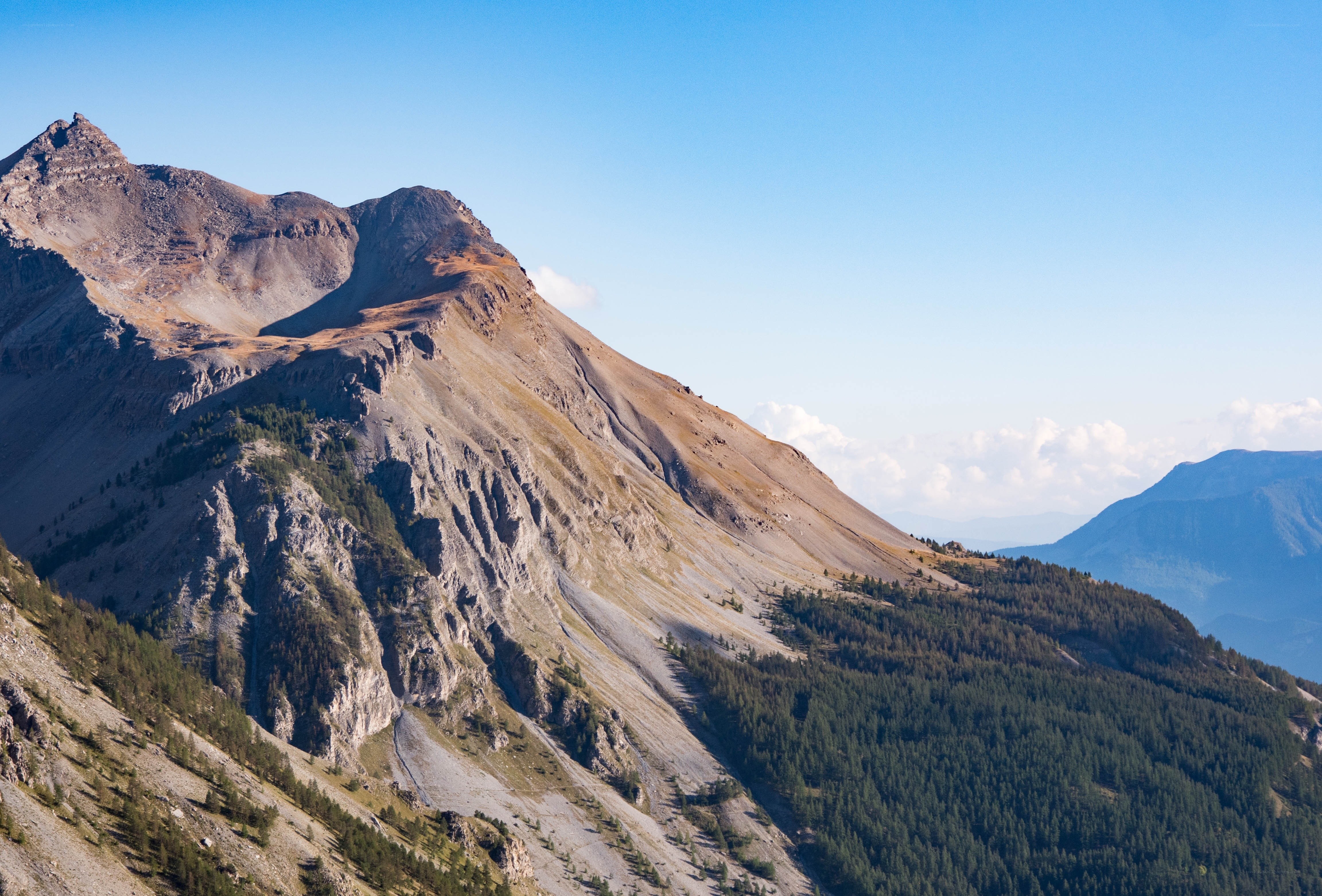 Mountain peak under clear sky