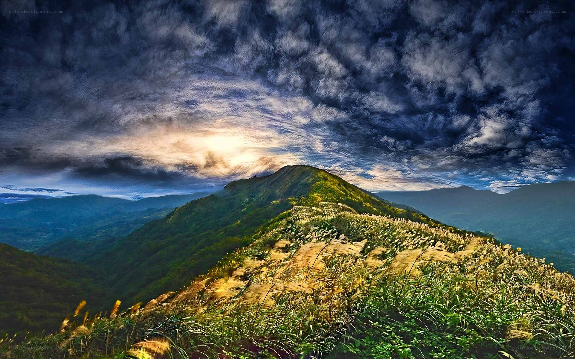Mountain peak under dramatic sky