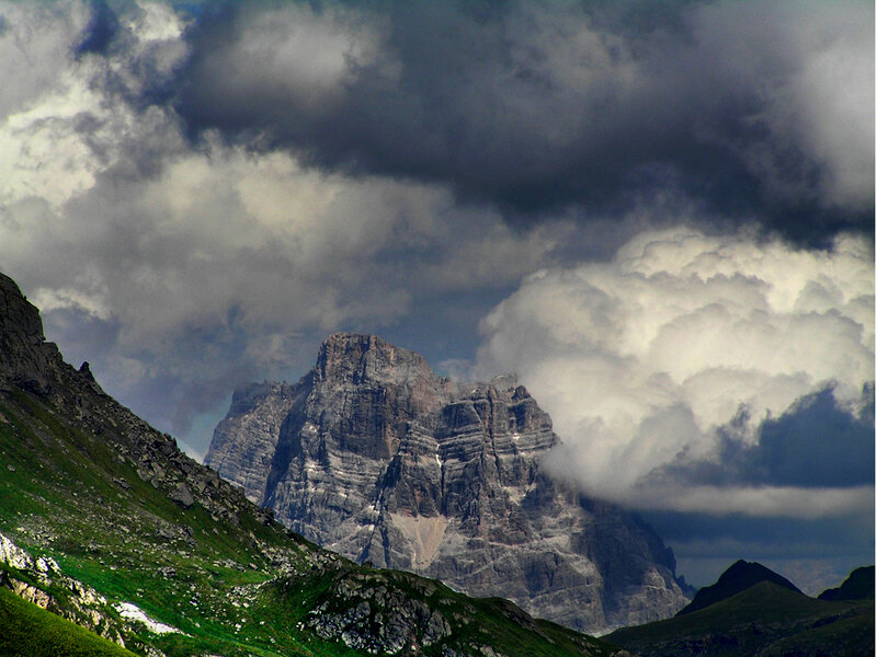 Mountain peak under stormy clouds