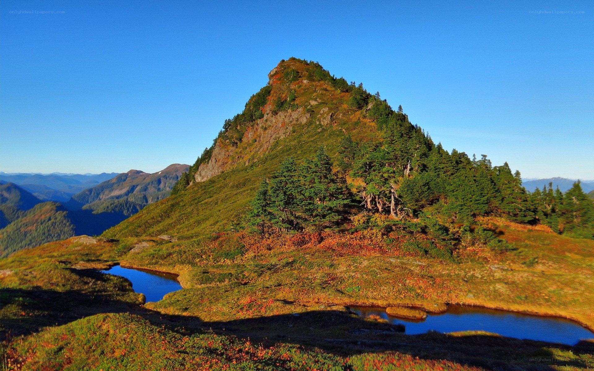 Mountain peak with alpine lake
