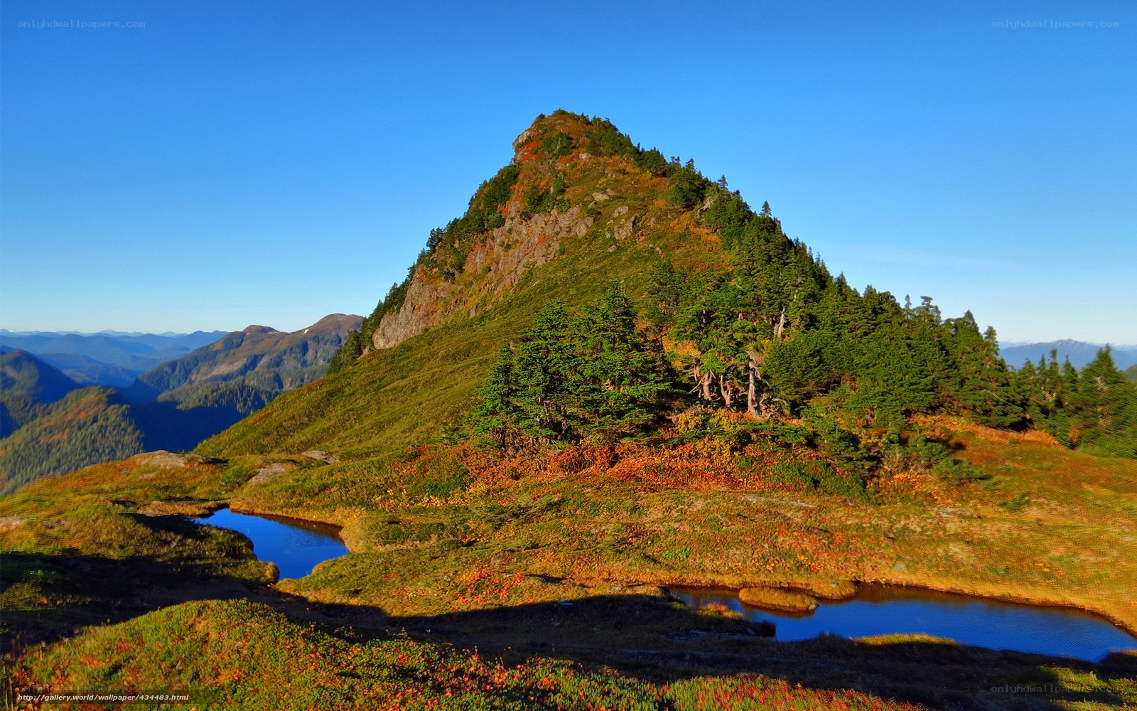 Mountain peak with alpine lake