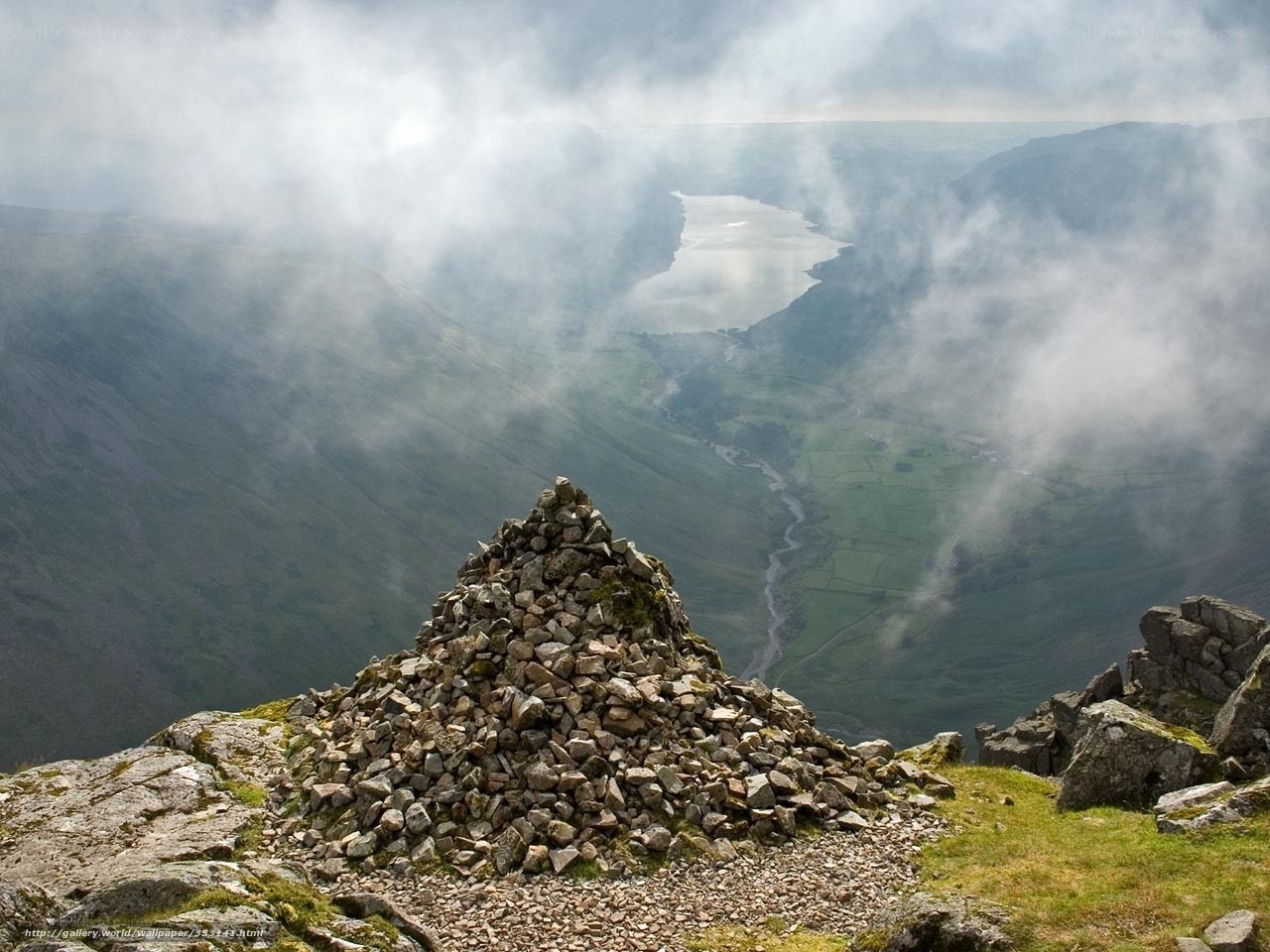 Mountain peak with cairn