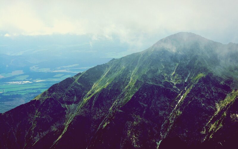 Mountain peak with clouds