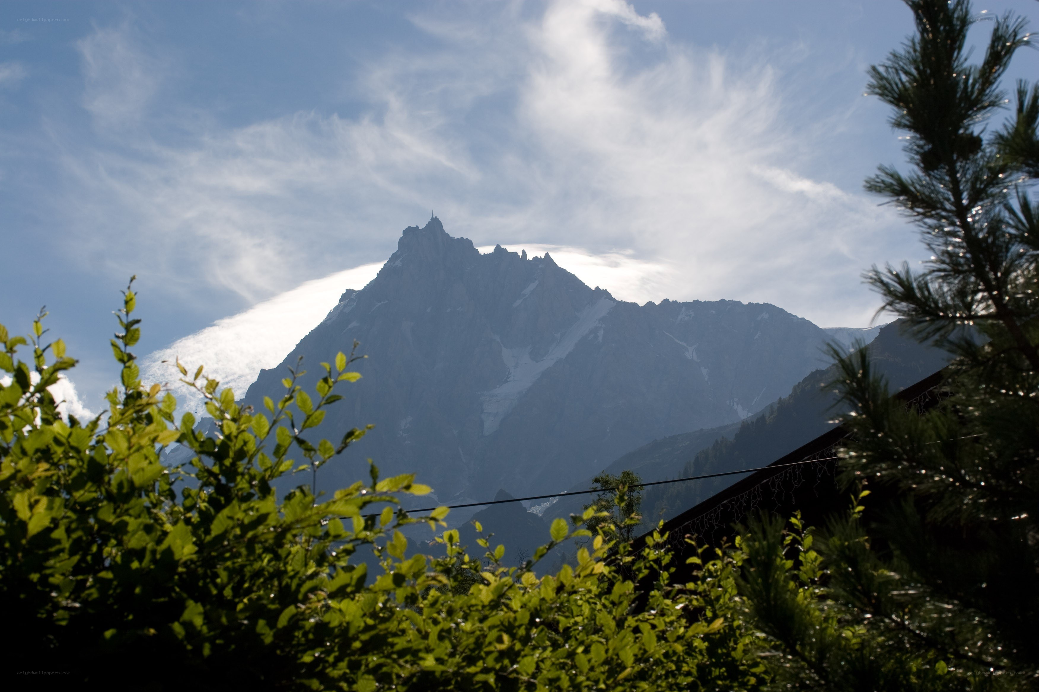 Mountain peak with clouds