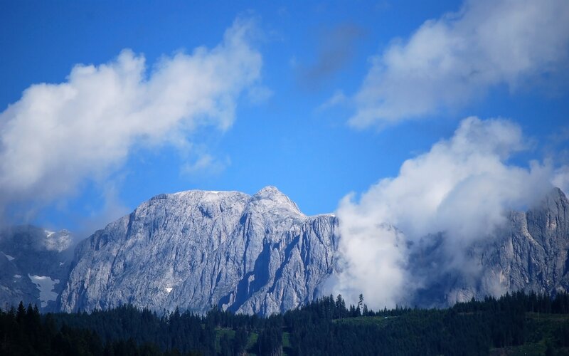 Mountain peak with clouds