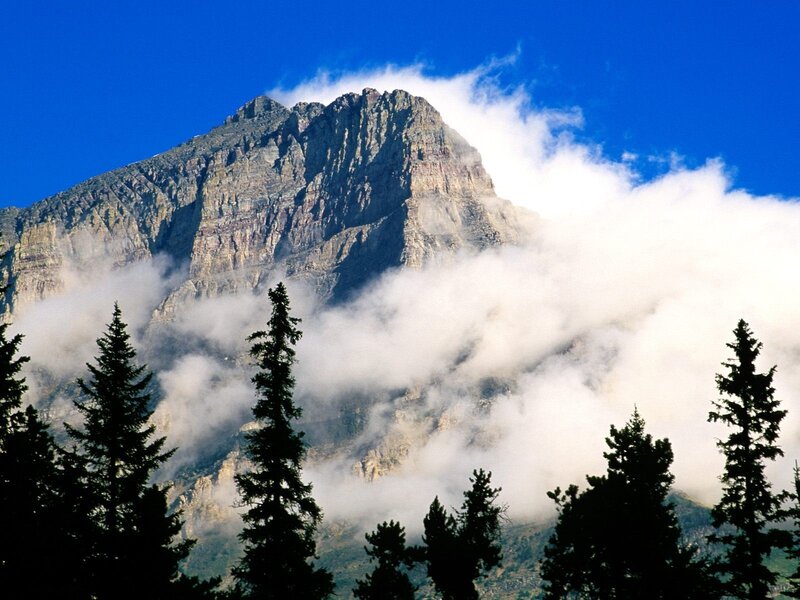 Mountain peak with clouds
