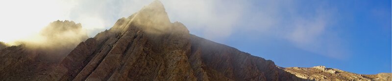 Mountain peak with clouds