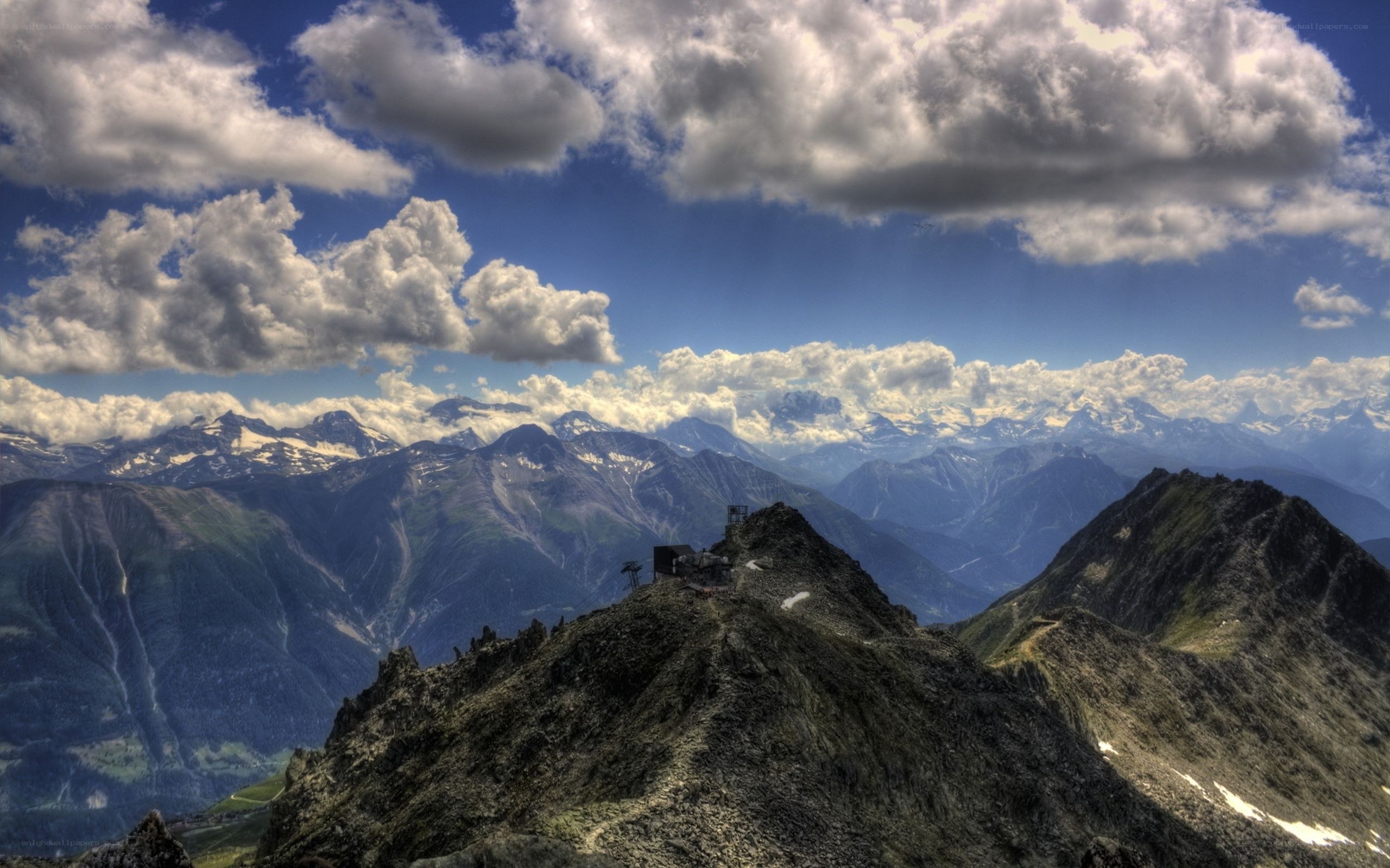 Mountain peak with clouds