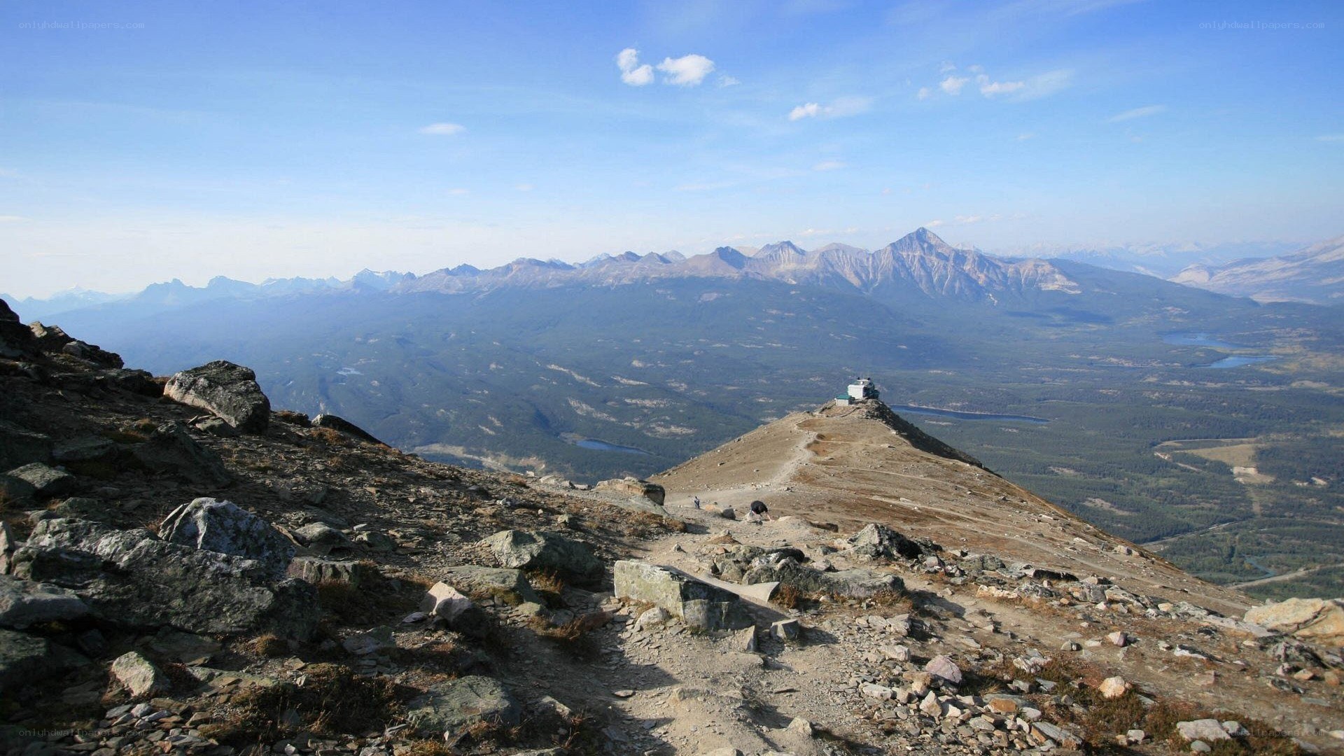 Mountain peak with distant valley