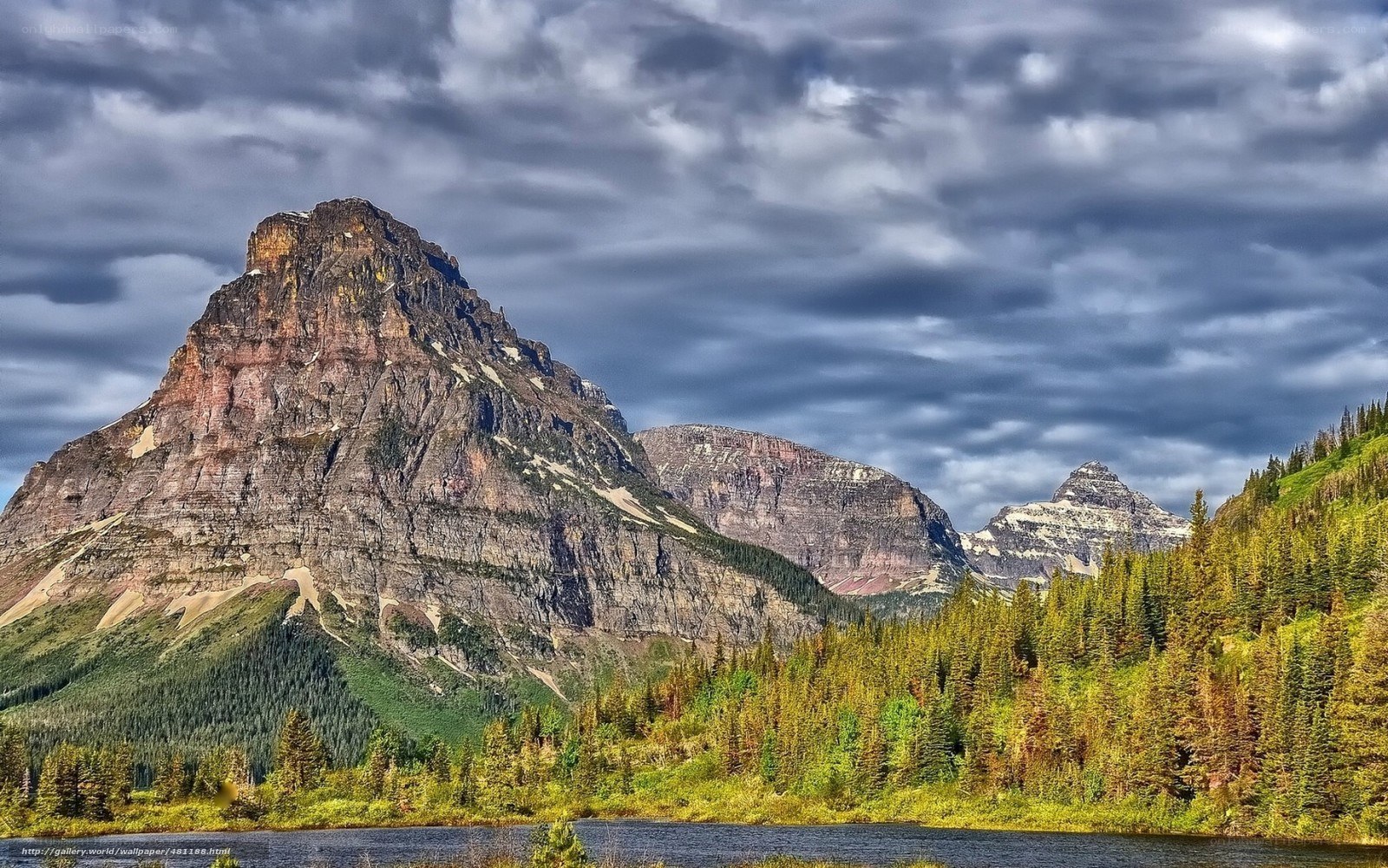 Mountain peak with forest and lake