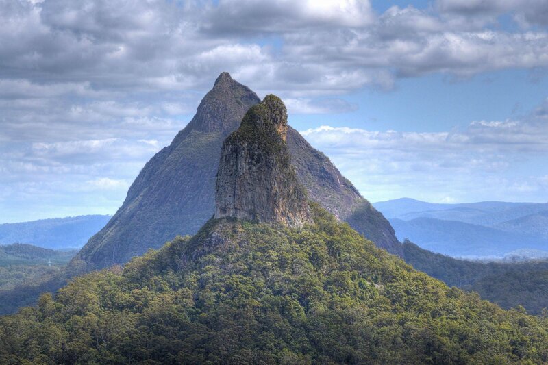 Mountain peak with forested base