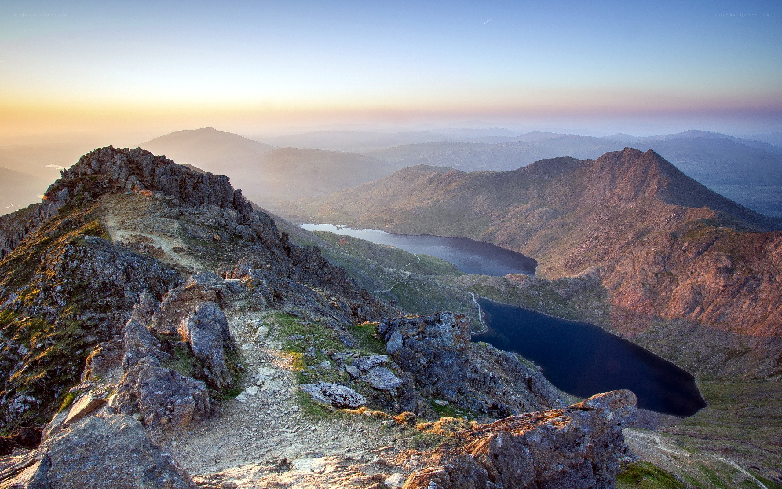 Mountain peak with lakes at sunrise