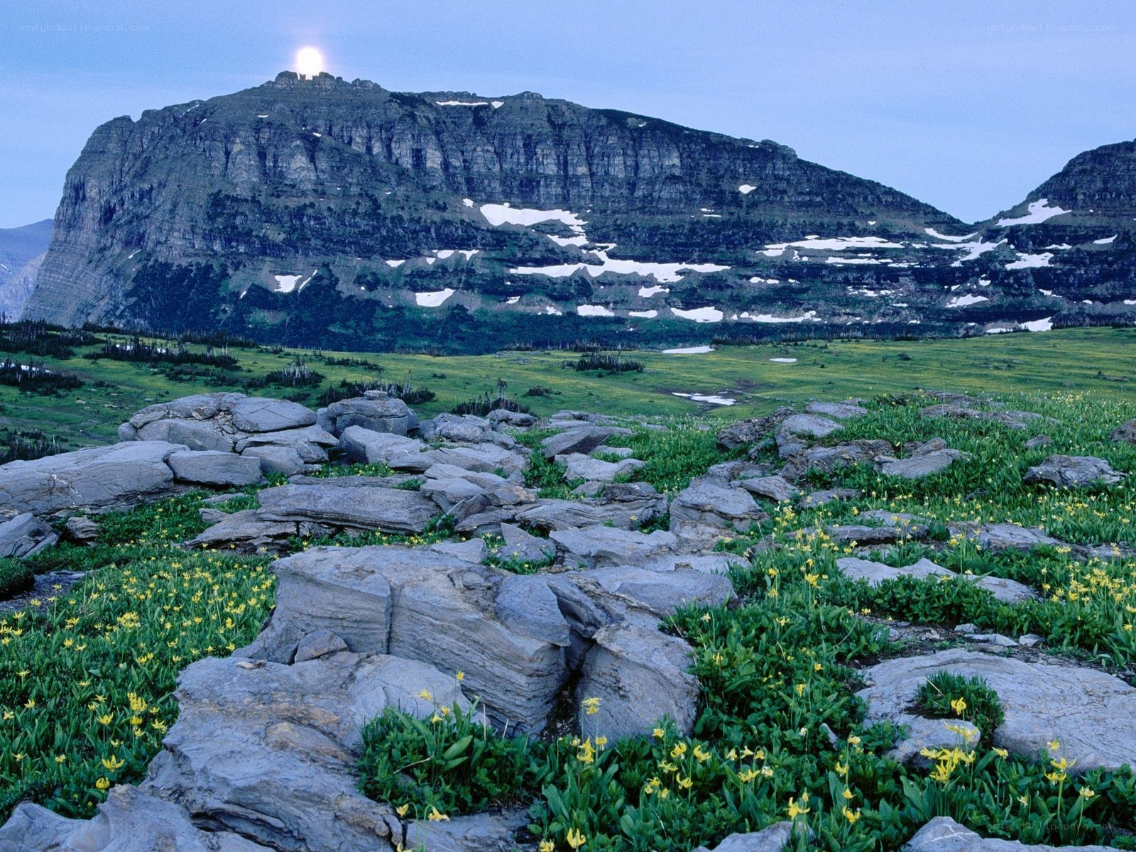 Mountain peak with moonrise