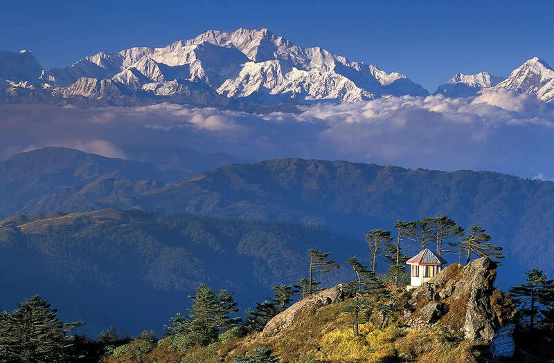 Mountain peak with small hut