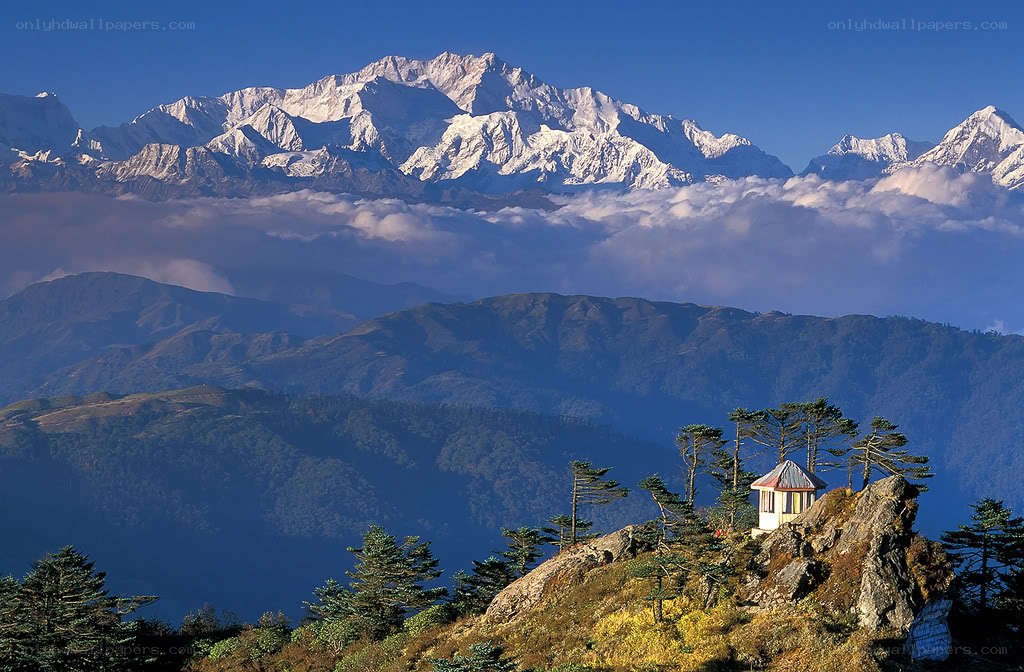 Mountain peak with small hut