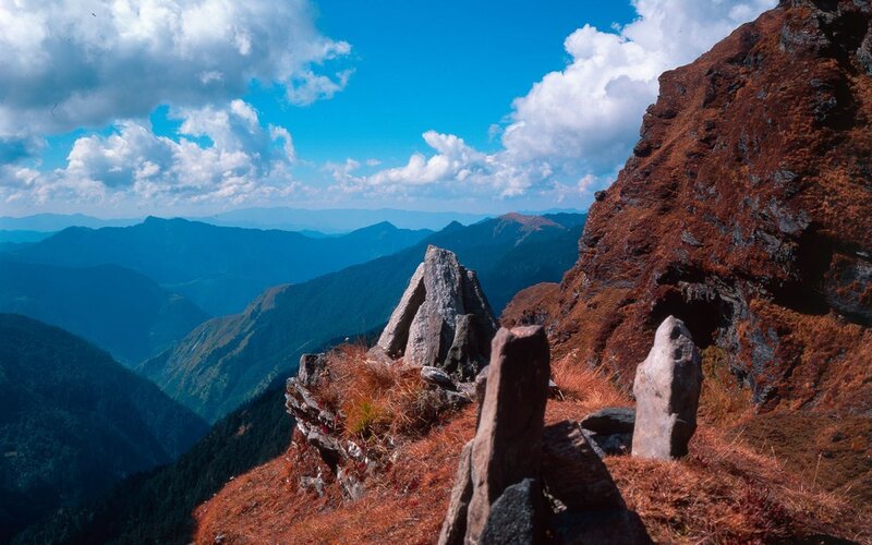 Mountain peak with stone markers