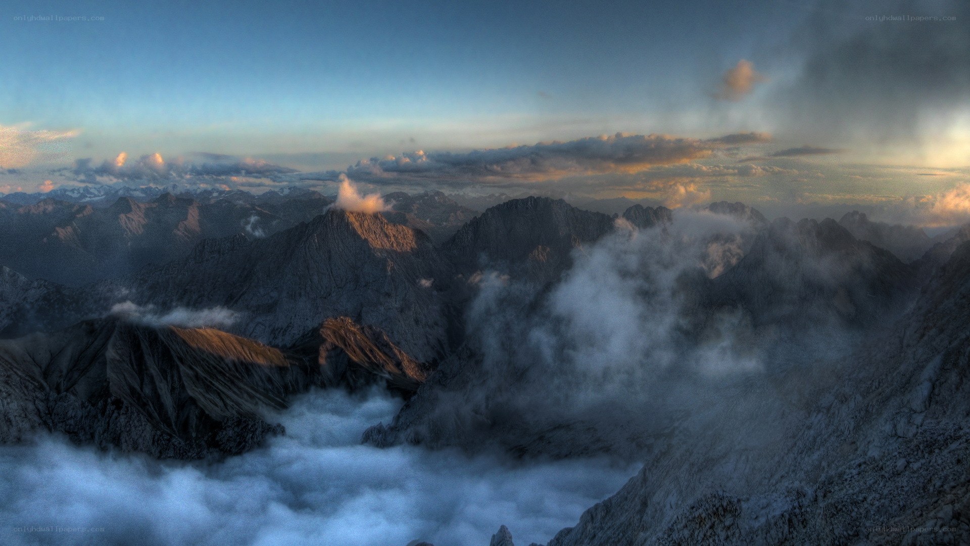 Mountain peaks above clouds
