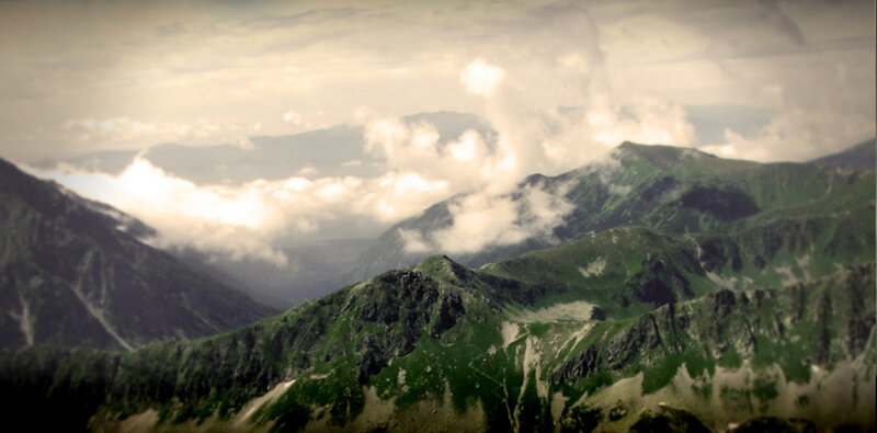 Mountain peaks above clouds