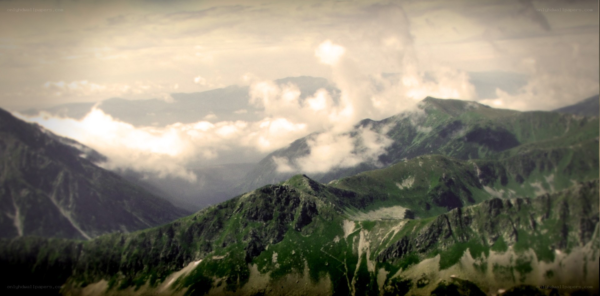 Mountain peaks above clouds