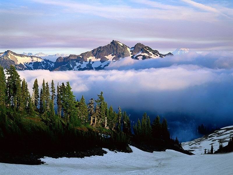 Mountain peaks above clouds