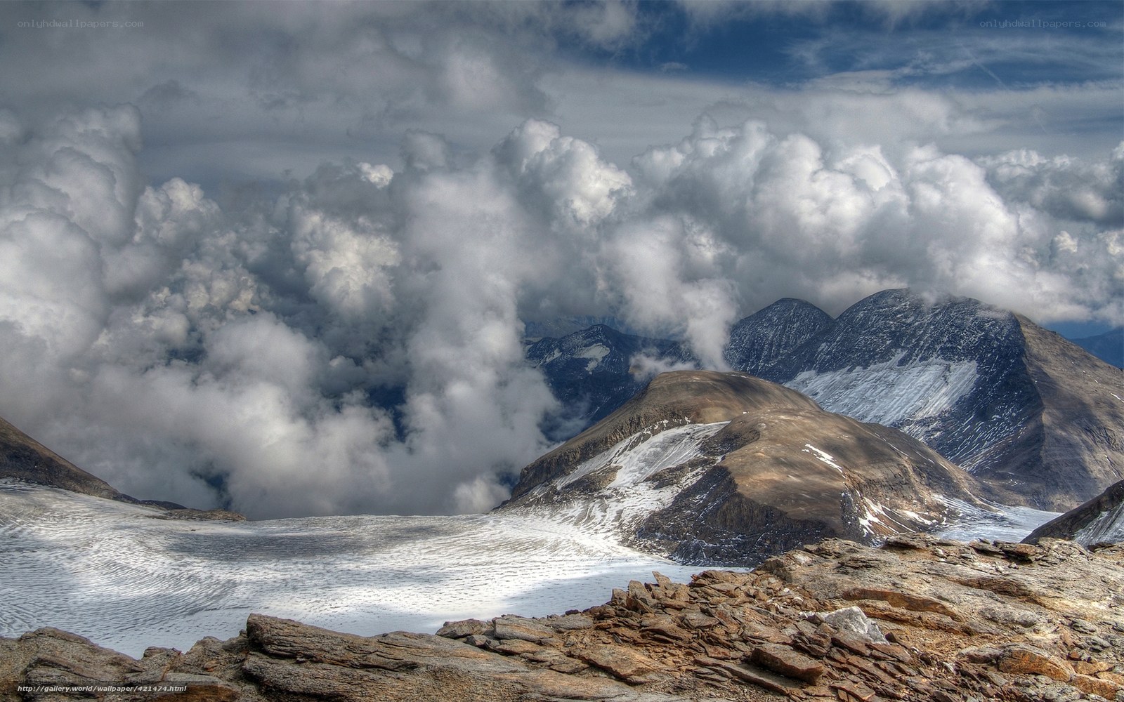 Mountain peaks above clouds