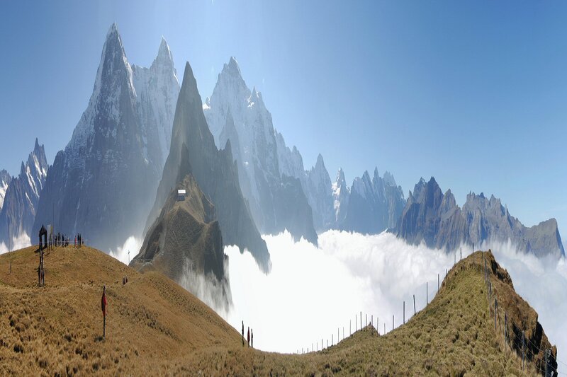 Mountain Peaks Above Clouds — Blue, Dramatic, Afternoon