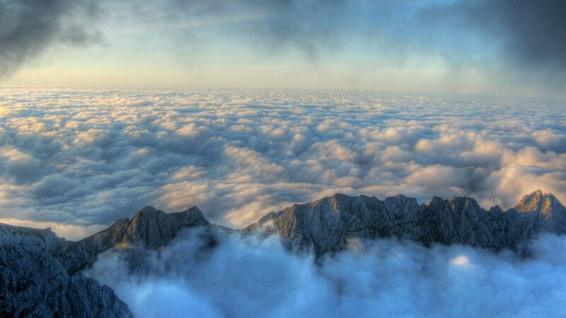 Mountain Peaks Above Clouds — Blue, Dramatic, Sunrise, Photograph