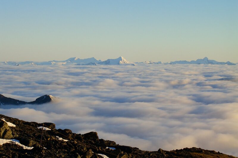 Mountain Peaks Above Clouds — Blue, Serene, Morning, Photograph, Snow