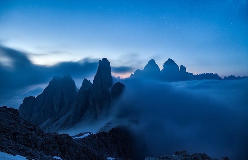 Mountain Peaks Above Clouds — Blue, Serene, Night