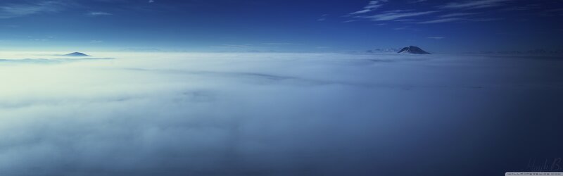 Mountain Peaks Above Clouds — Blue, Serene, Photograph, Sky