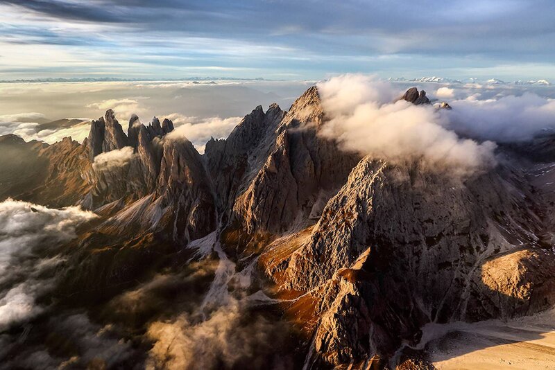 Mountain Peaks Above Clouds — Gray, Dramatic, Sunrise