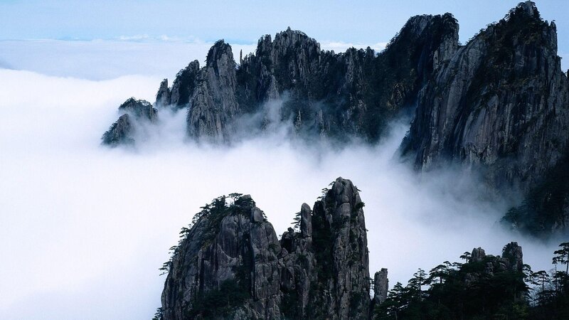 Mountain Peaks Above Clouds — Gray, Serene, Morning