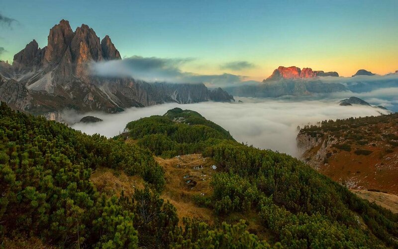 Mountain Peaks Above Clouds — Green, Serene, Sunrise