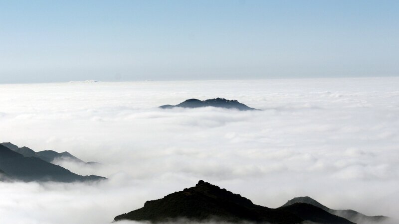 Mountain Peaks Above Clouds — Mountains