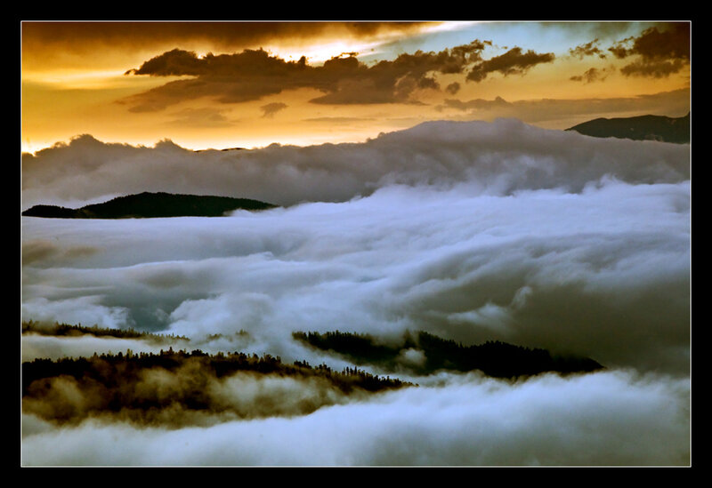 Mountain Peaks Above Clouds — Orange, Dramatic, Sunset, Photograph, Mountains