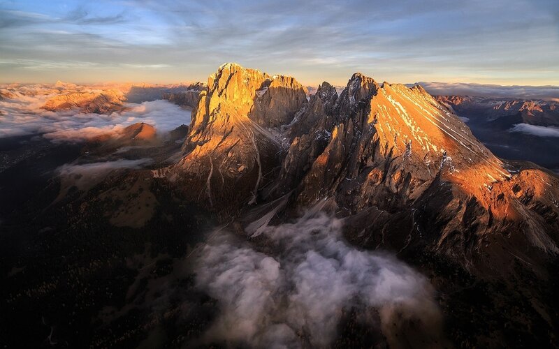 Mountain Peaks Above Clouds — Orange, Dramatic, Sunset, Photograph, Sunlight