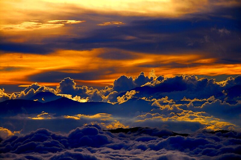 Mountain Peaks Above Clouds — Orange, Dramatic, Sunset