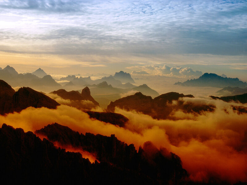 Mountain Peaks Above Clouds — Orange, Dramatic