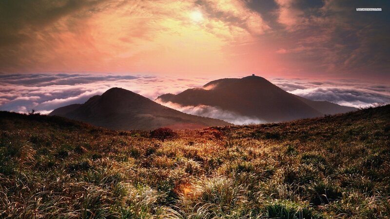 Mountain Peaks Above Clouds — Orange, Serene, Sunrise