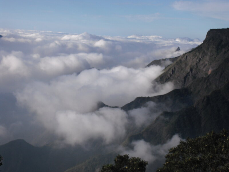 Mountain Peaks Above Clouds — White