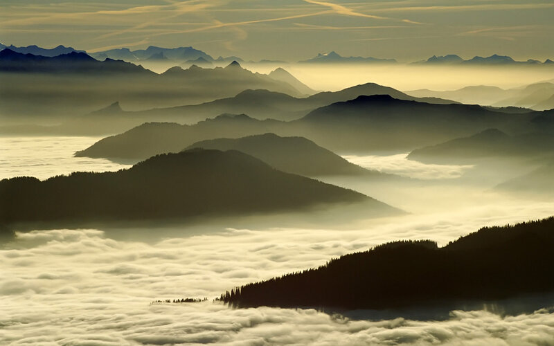 Mountain Peaks Above Clouds — Yellow, Serene, Morning, Photograph