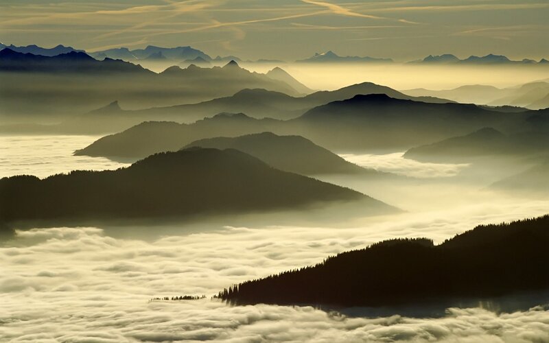 Mountain Peaks Above Clouds — Yellow, Serene, Morning