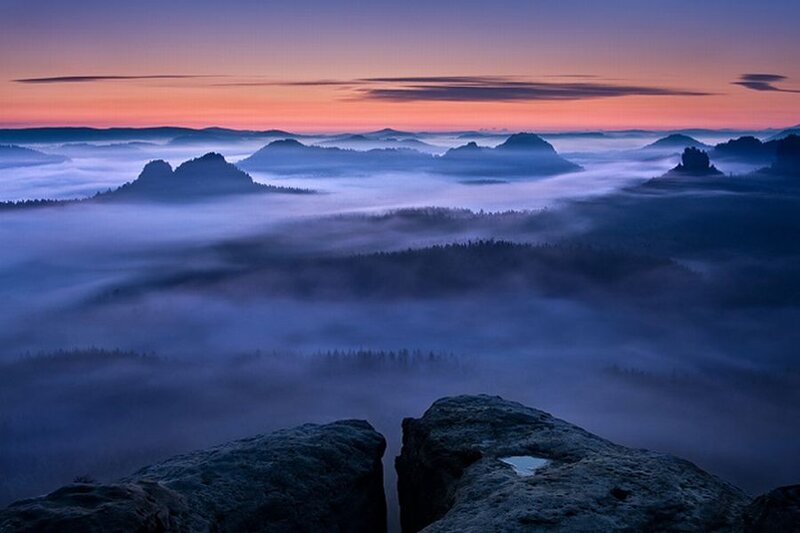 Mountain Peaks Above Fog