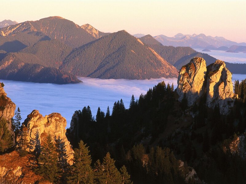 Mountain peaks above sea of clouds