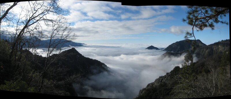 Mountain peaks above sea of clouds