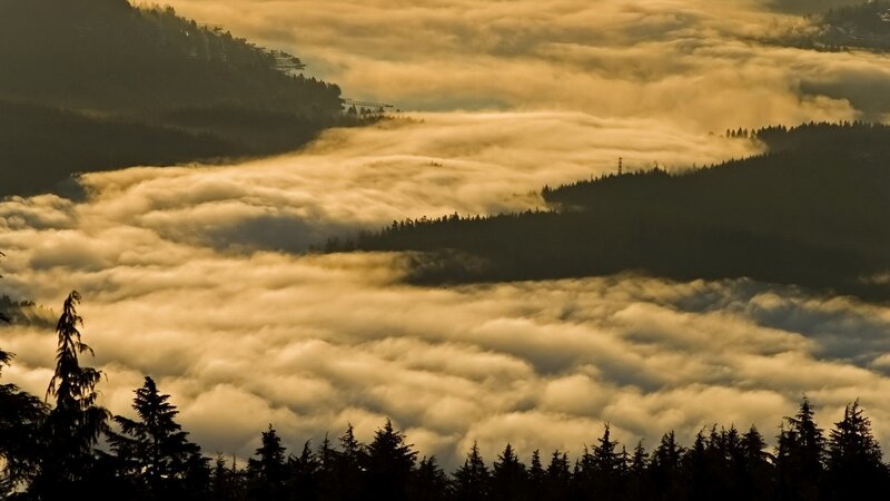 Mountain peaks above sea of clouds