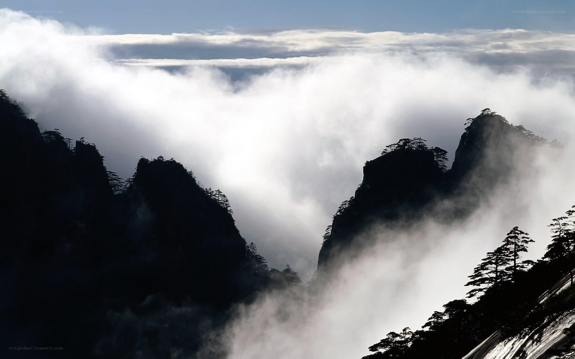 Mountain peaks above the clouds