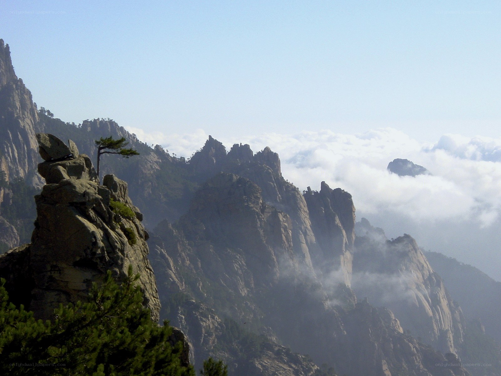 Mountain peaks above the clouds